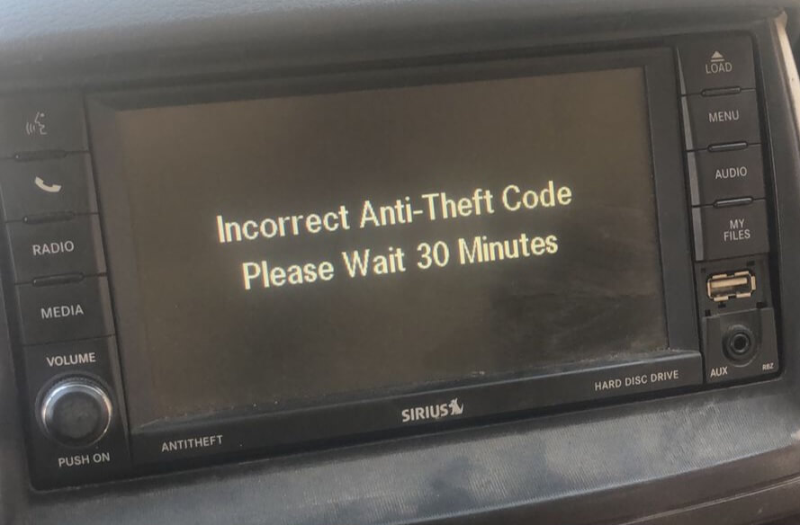 Chrysler MyGIG radio locked screen showing incorrect anti-theft code error